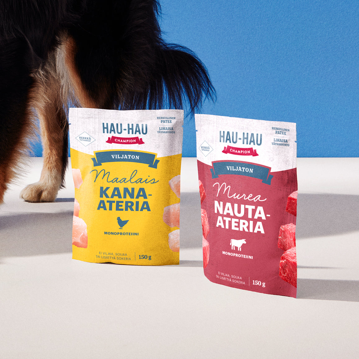 Hau-Hau Champion Maalais kana-ateria ja Murea nauta-ateria viljaton koiran märkäruoka kuvituskuva