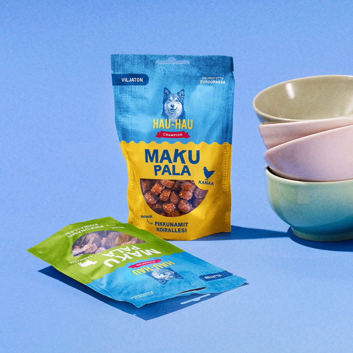 Fiiliskuva, jossa on Makupala kanaa ja Makupala lammasta tuotepakkaukset sinisellä taustalla