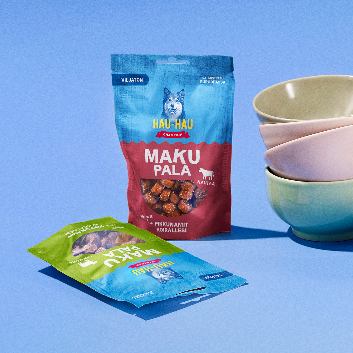 Fiiliskuva, jossa on Makupala nautaa ja Makupala lammasta tuotepakkaukset sinisellä taustalla